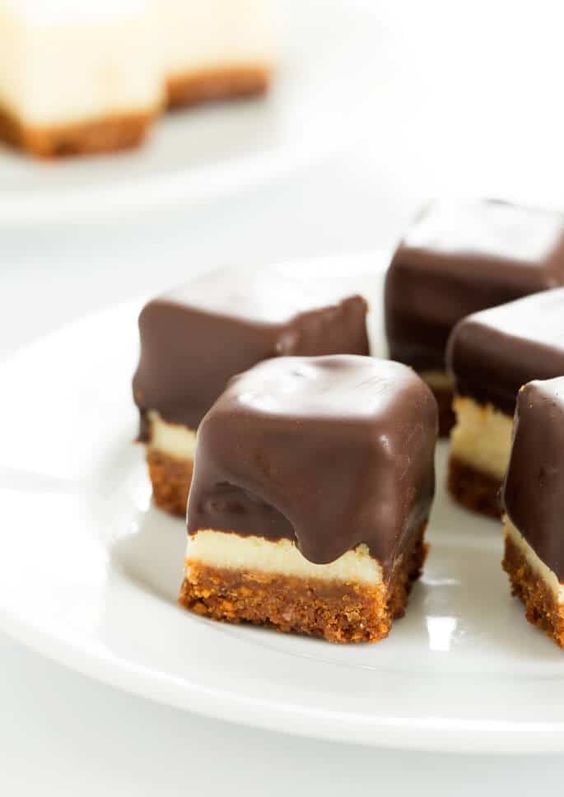 Cheesecake bites are nothing more than little chocolate-covered bites of creamy cheesecake. No special equipment and no water bath needed, since chocolate covers all. SO good!