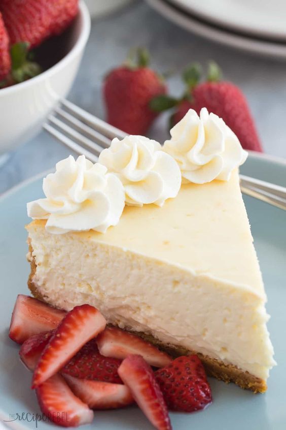 This Vanilla Cheesecake is super creamy and not as heavy as traditional baked cheesecake thanks to a good dose of sour cream! Includes step by step VIDEO