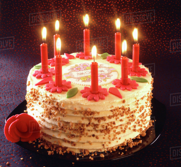 Birthday Cake Candles
 Birthday cake with burning candles Stock Dissolve