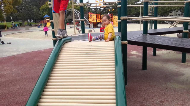 DIY Kids Slide
 Peter at the de anza playground rolling slide