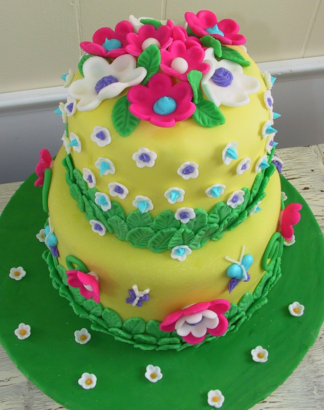 Flower Birthday Cake
 Butterflies flowers and fondant Birthday Cake
