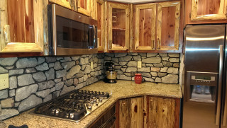 Rustic Kitchen Backsplash
 Rustic Red Cedar Kitchen with cultured Stone Backsplash